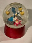 Nordstrom 2011 Holiday snow globe featuring birds in a nest with presents. — photo 1