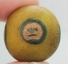 Old Roman Face Bead Yellow Glass Eye Amulet Drilled Pendant Collectible