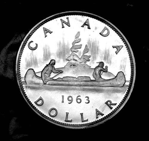 1963 $1 silver proof like coin from the set.  In mint cellophane a MS coin