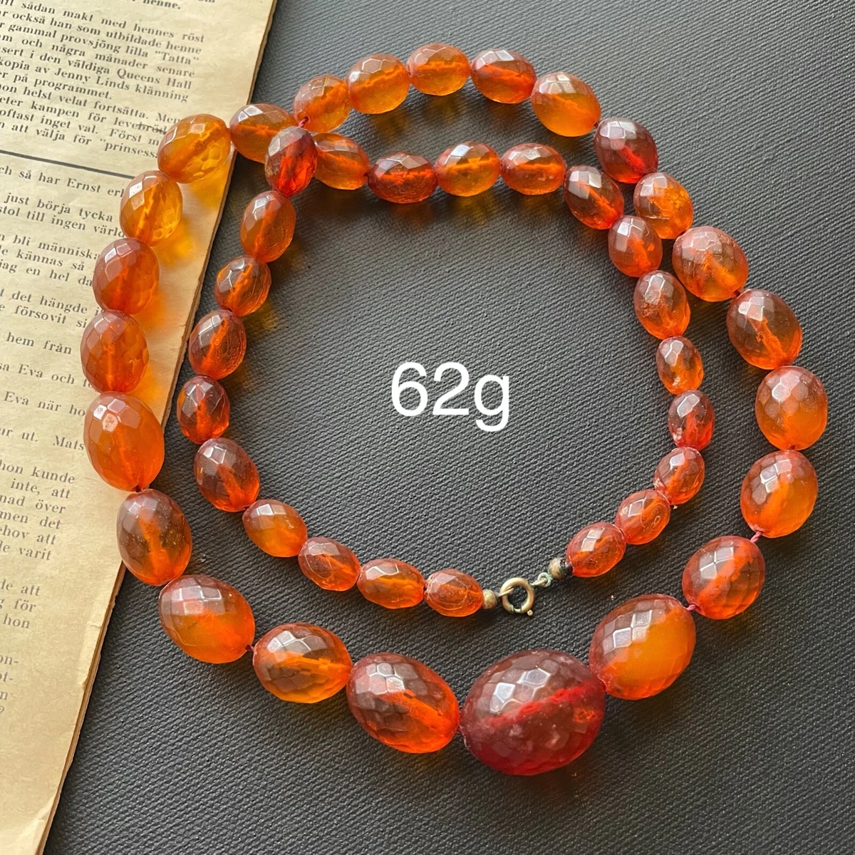 Antique amber bead best sale necklace