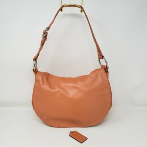 coach purse orange leather