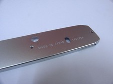  NEW    Olympus OM-10 Bottom Cover Silver. RARE Vintage Part 