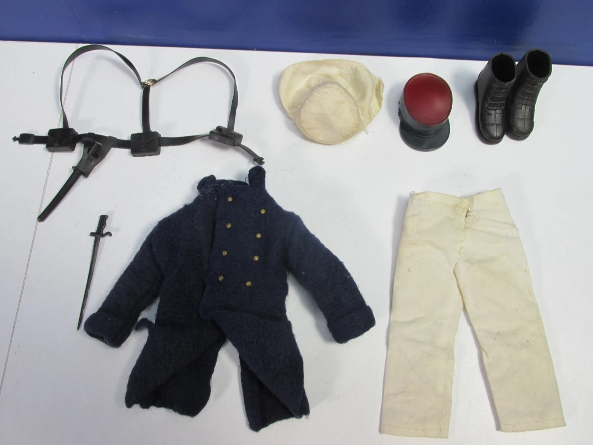 Four vintage Action Man figures together with a collection of original