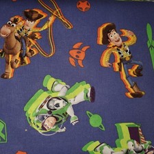 Toy Story on blue By The Yard x 43 inches cotton fabric Springs