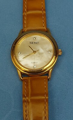 WOMAN'S MONET WRIST WATCH MOTHER OF PEARL FACE HONG KONG MOVEMENT NOT WORKING