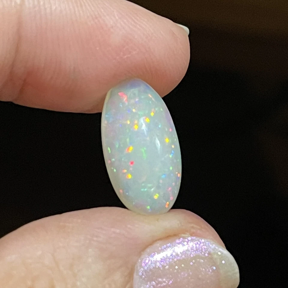 4.7ct 18x9.4x6mm Sparkling Stardust Oval Ethiopian Welo Opal Gemstone Loose Gem - Image 4 of 4