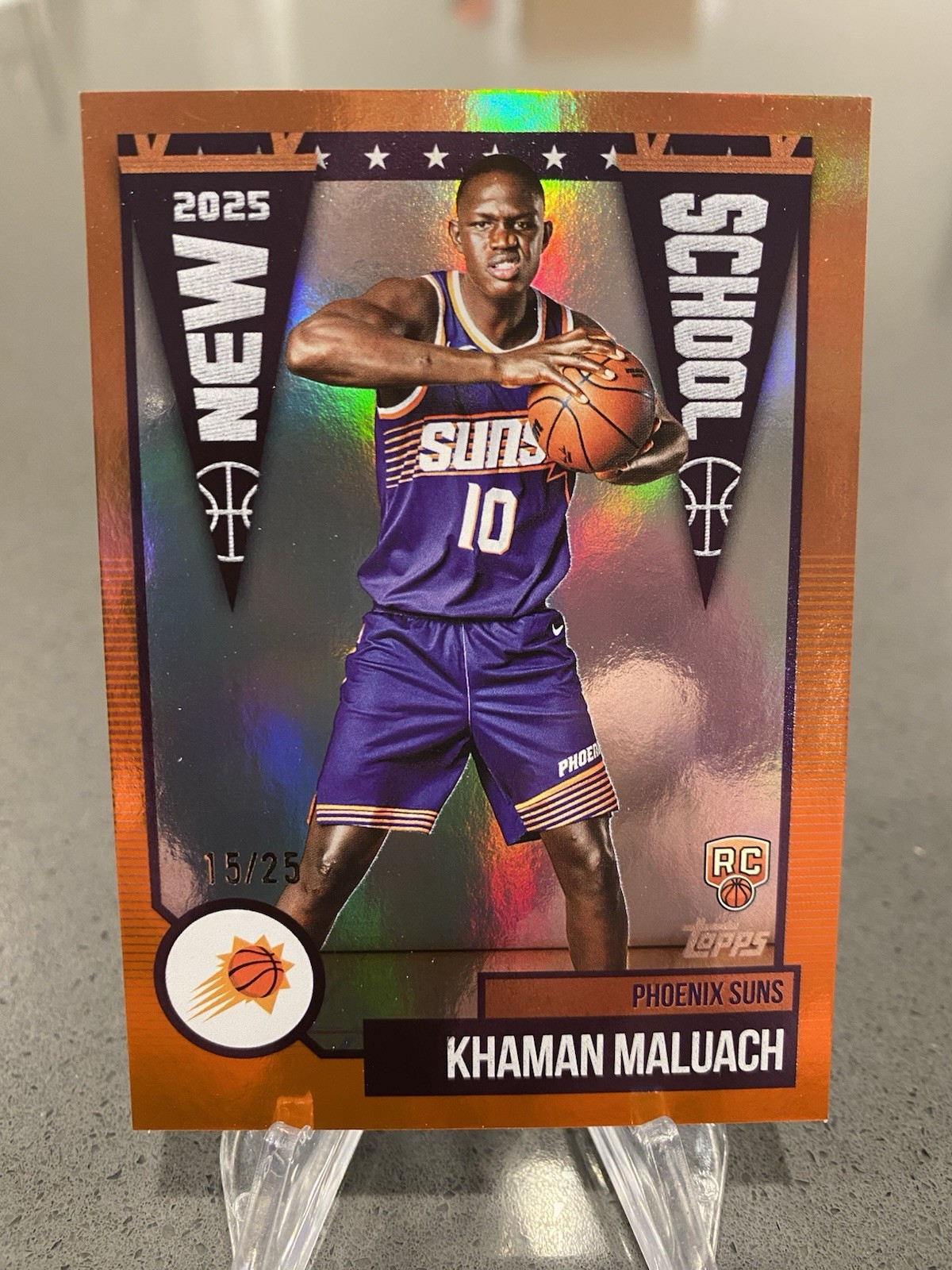 2025-26 Topps Khaman Maluach Flagship New School Orange Foil /25 RC #NS-10 Suns