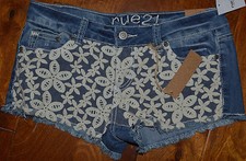 Pantalones cortos de mezclilla elásticos con superposición de encaje floral Rue 21 Jrs. Pantalones cortos 3,5,7,11