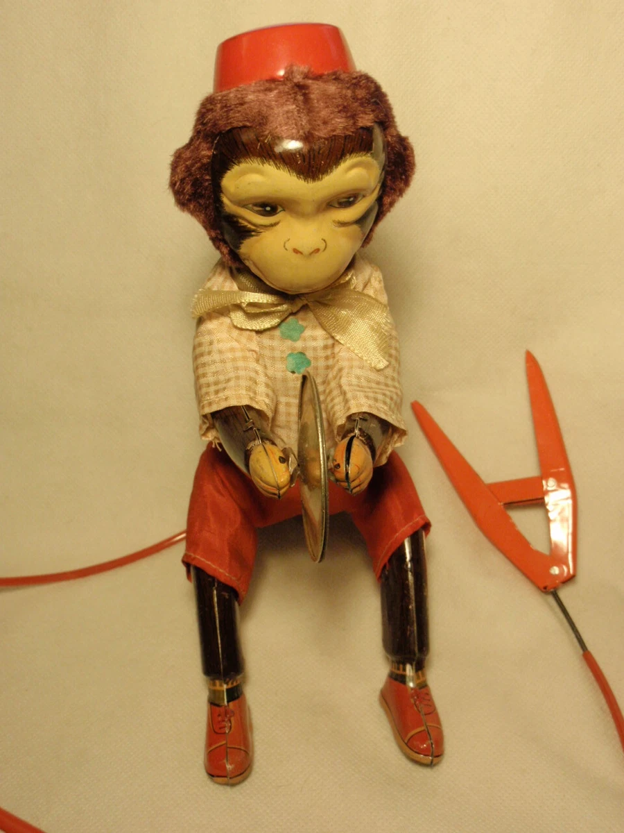Tin hotsell monkey toy