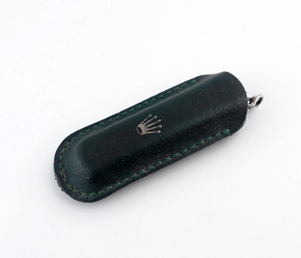 Navaja de bolsillo Rolex / multiherramienta con soporte de cuero firmado (artículo #439) Foto 3 de 4