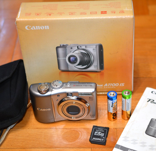 Canon PowerShot A1100 IS 12.1MP Digital Camera Silver 4XZoom With SD Card In Box