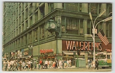 Postcard State and Madison Sts. with Walgreens Drug Store in Chicago, IL.