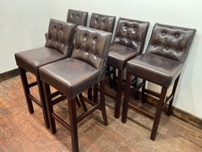 Set of 6 matching brown leather bar stools
