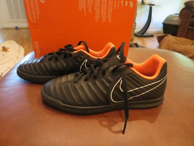 orange nike turf shoes