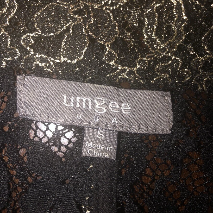 Chaqueta corta Umgee negra metálica dorada de encaje para moto talla S basculante asimétrica con cremallera Foto 2 de 4