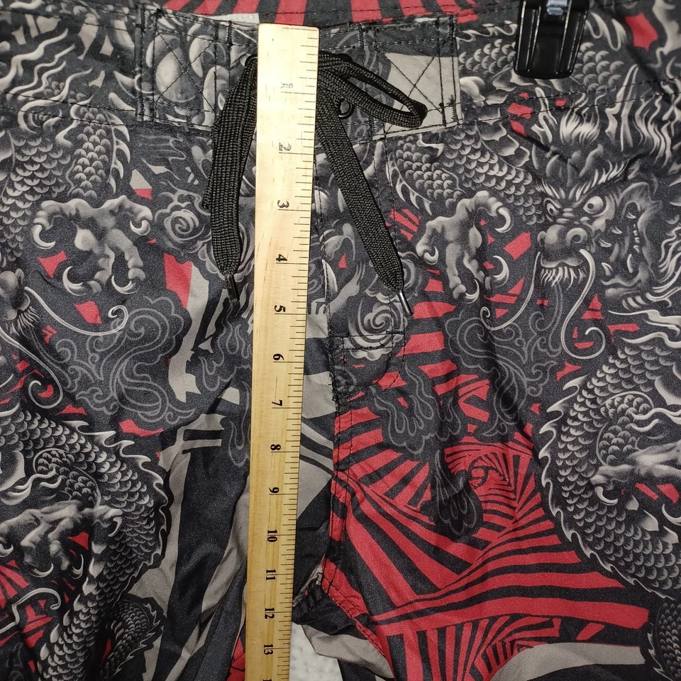 Bañador corto de surf azul líquido para hombre talla 32 rojo negro dragón sin forro (DP) Foto 4 de 4