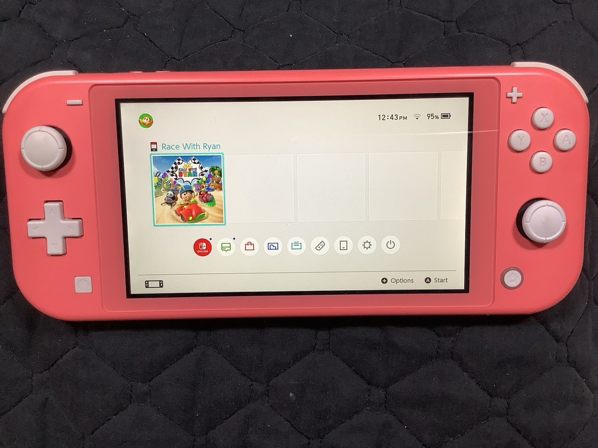 Nintendo Switch Lite (HDH-001) Handheld - Coral Pink. Good Overall