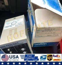 one OMRON proximity sensor amplifier E2CA-AL4C