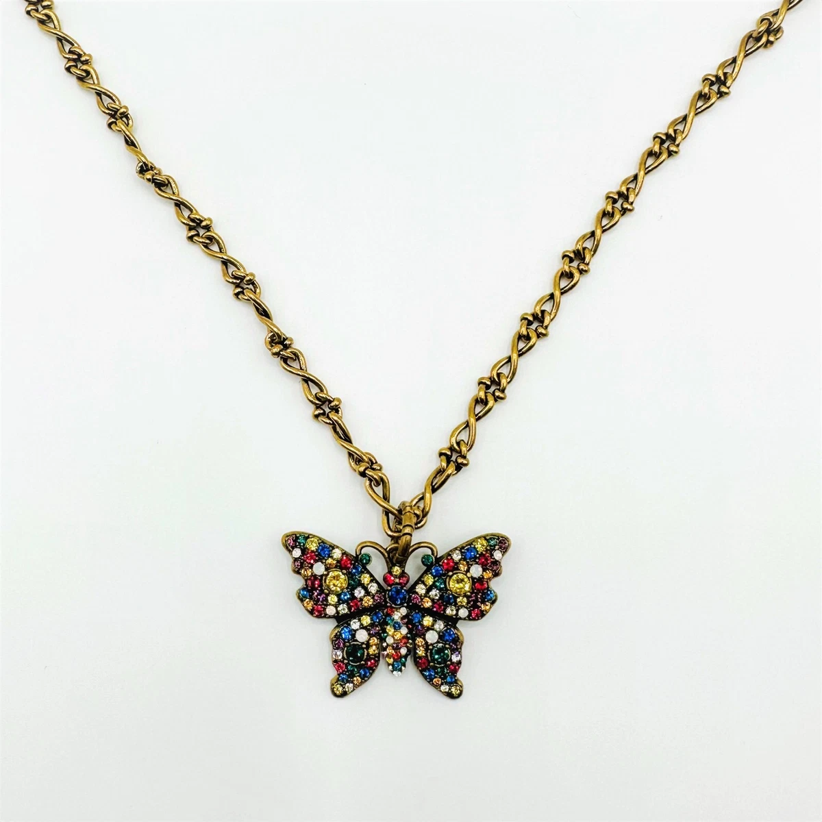 Gucci Aged Gold Metal Butterfly Necklace with Multicolor Crystal Multiple  colors ref.889249 - Joli Closet