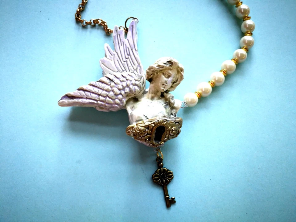 Antiguo collar colgante talismán querubín ángel alado de la guarda joyería amuleto Foto 2 de 4