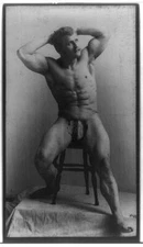 8" x 10" Photo Eugen Sandow, full-length portrait, seated on stool facing right