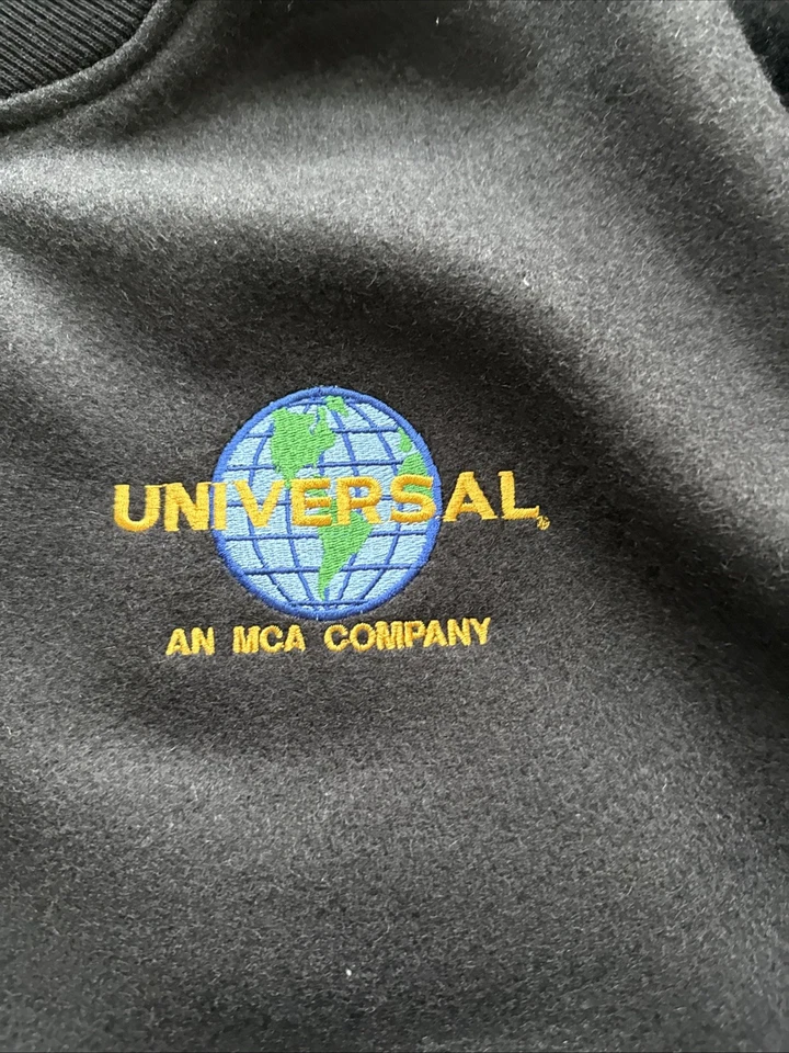 Chaqueta Bomber Vintage Universal Studios MCA Lana Cuero Años 80 90 Talla L Foto 2 de 4