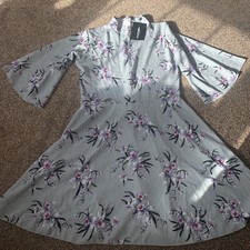 Dress floral pattern, size 14 -new condition with tag- Pretty little thing make.