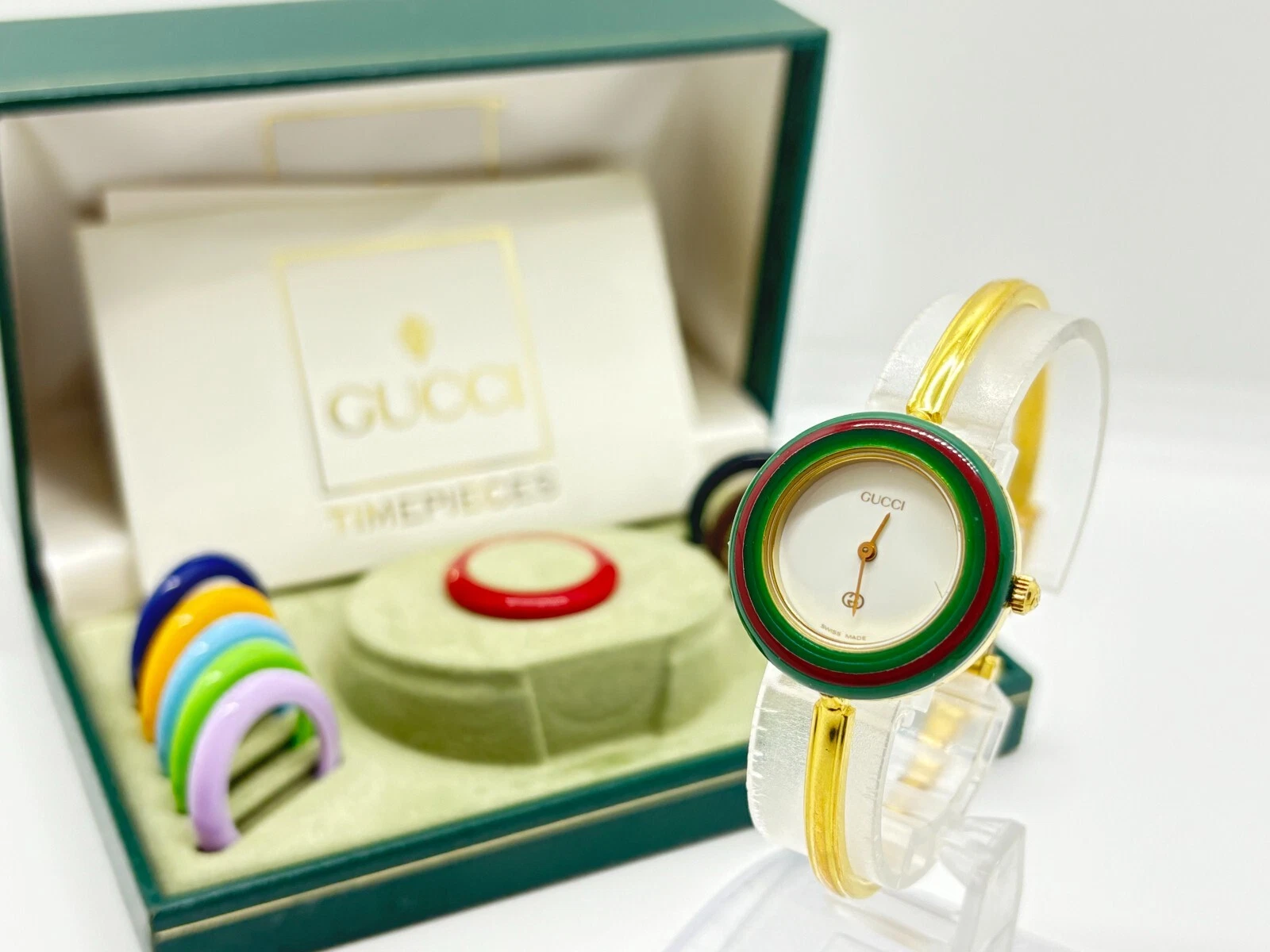 [Presque comme neuve avec boite] Montre Gucci lunette change 11/12 12 couleurs or occasion fonctionne