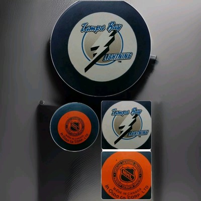 TAMPA BAY LIGHTNING NHL INGLASCO PUCK MADE IN CZECHOSLOVAKIA ON SIDE CANADA SIDE