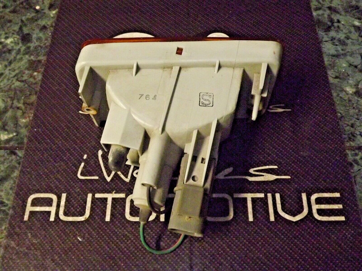 87-89 OEM Nissan Stanza T12 front driver turn signal light Koito