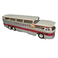 Vintage 1955 Trailways Friction Thruliner Bus Silver and Red 18"