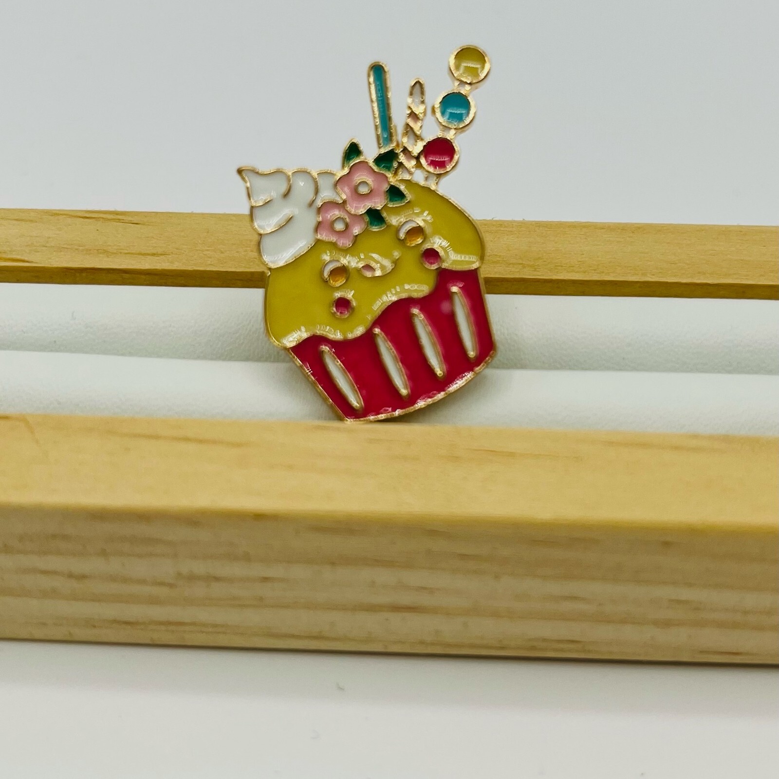 Cute cupcake enamel pin novelty accessory for bags and jackets-image