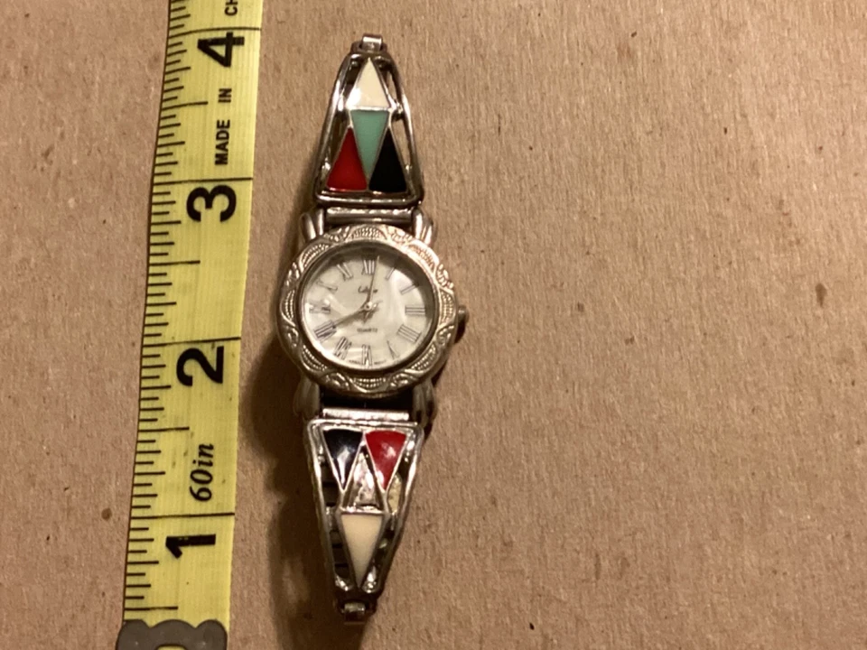 Reloj de mujer COLLEZIO cara blanca - correa plateada flexible - batería nueva - funciona Foto 2 de 4