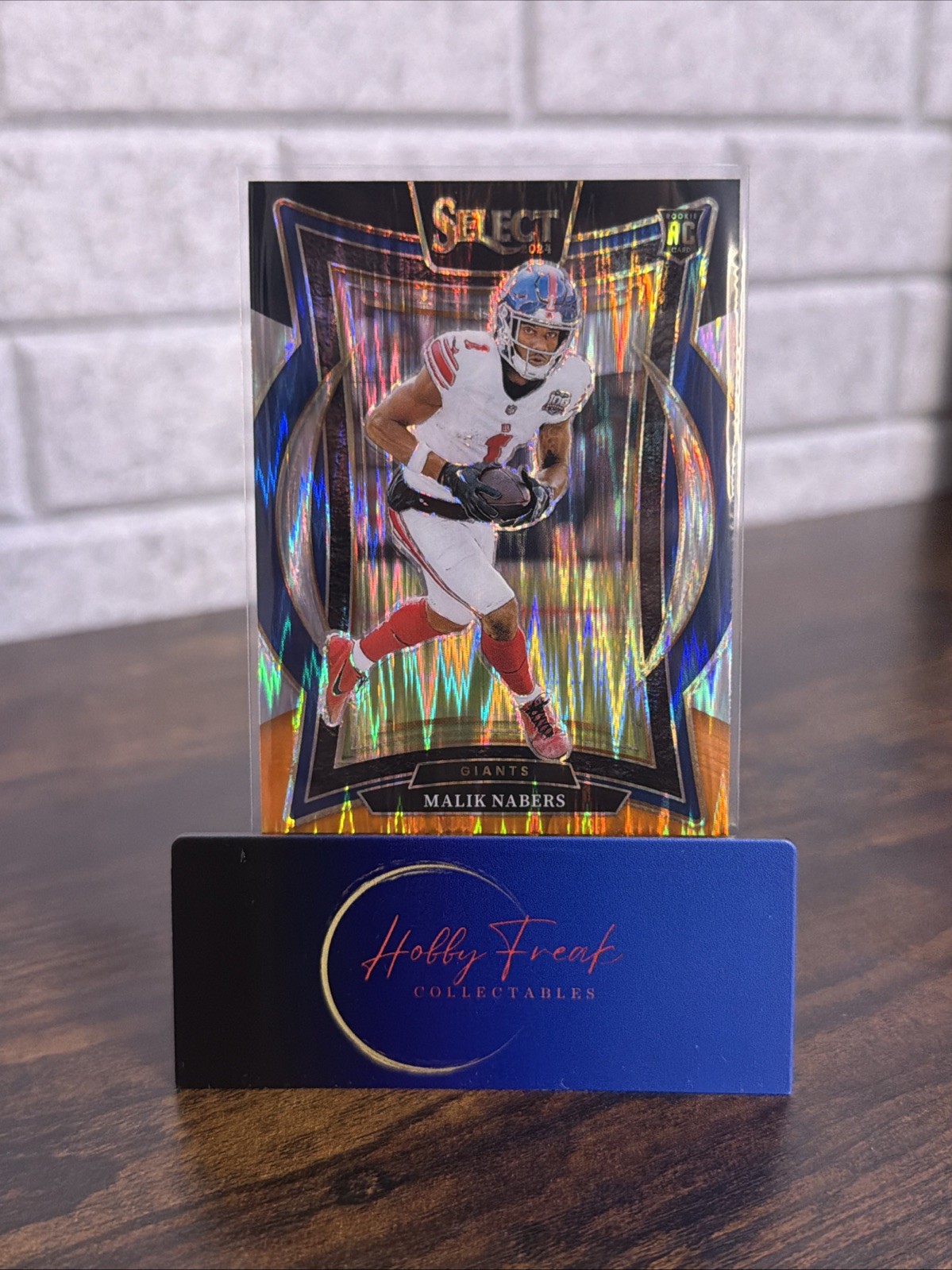 2024 Panini Select - Concourse Malik Nabers #29 Black & Orange Shock Prizm (RC)