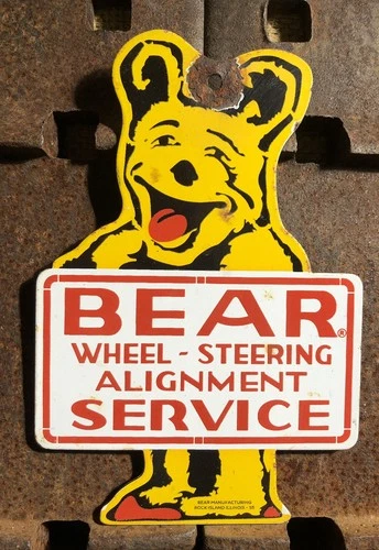 VINTAGE 1955 DATED BEAR WHEEL ALIGNMENT 8” PORCELAIN SIGN GAS OIL SERVICE