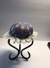 Handmade Pincushion, one of a kind, black metal base with blue floral top.