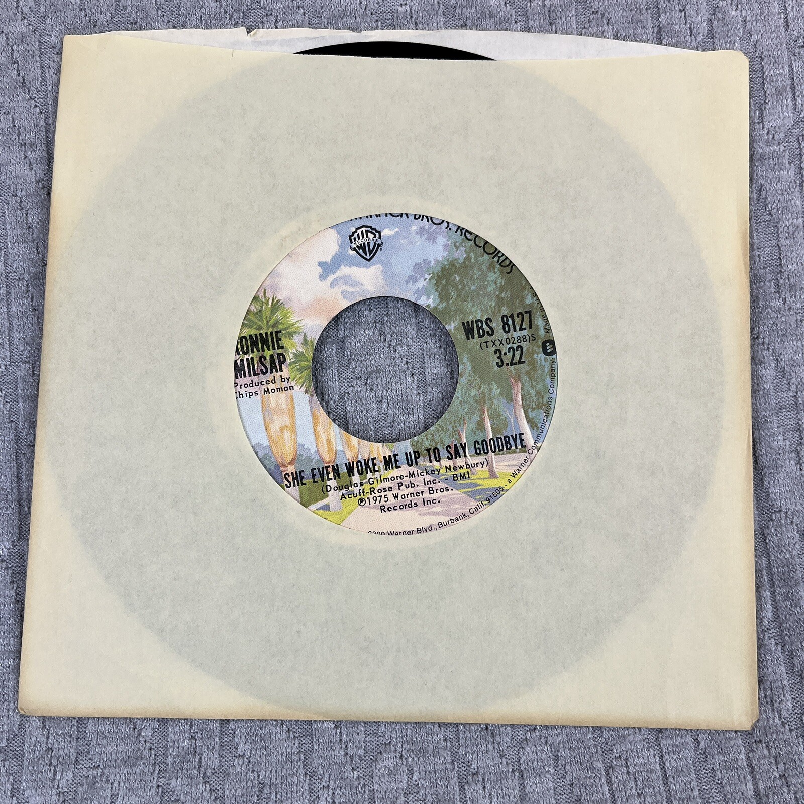 Vintage 45 RPM record Ronnie Milsap Warner Brothers records country blues rock