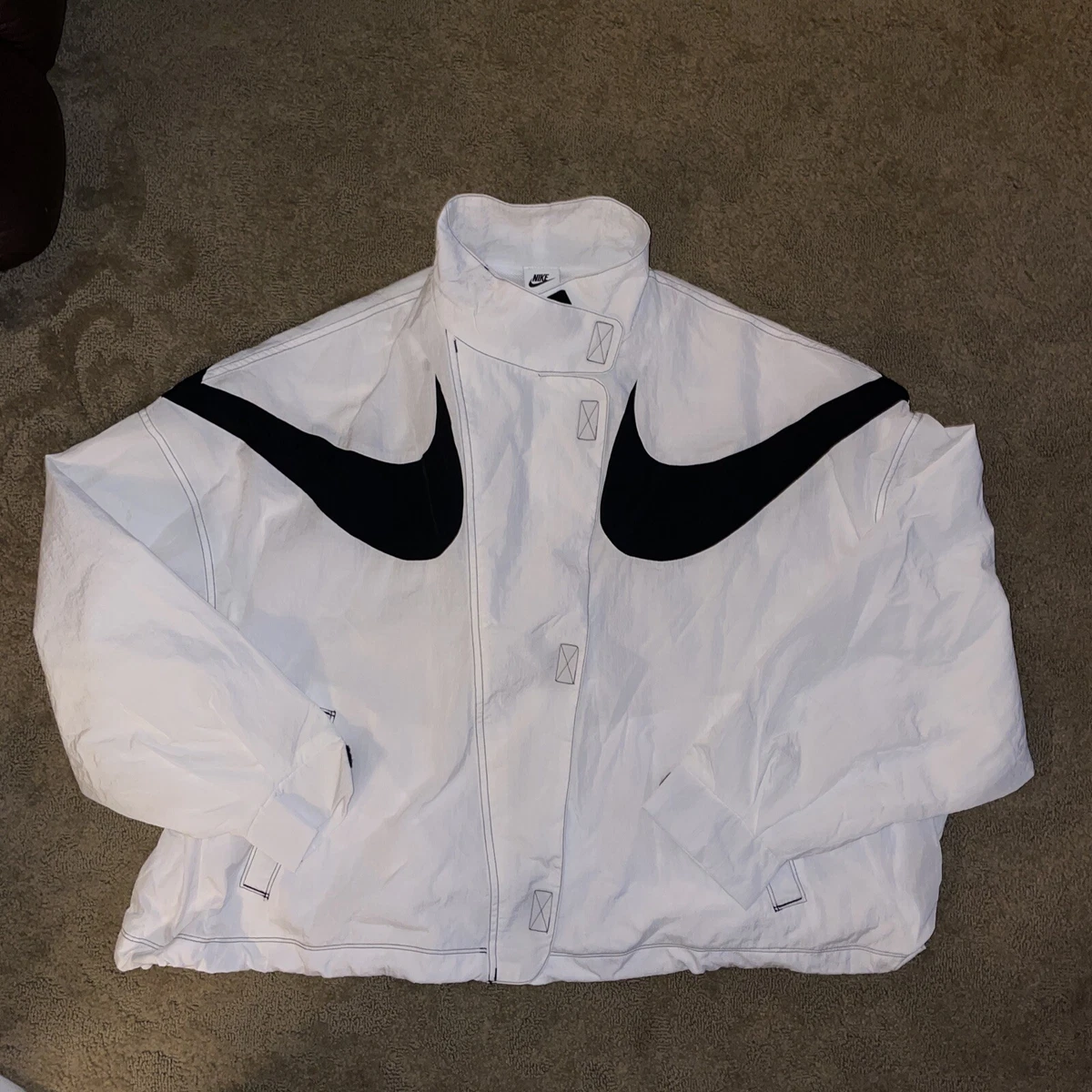 nike swoosh repel