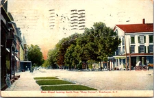 Postcard NY View Main Street Looking North Busy Corner Sherburne Store Signs B10