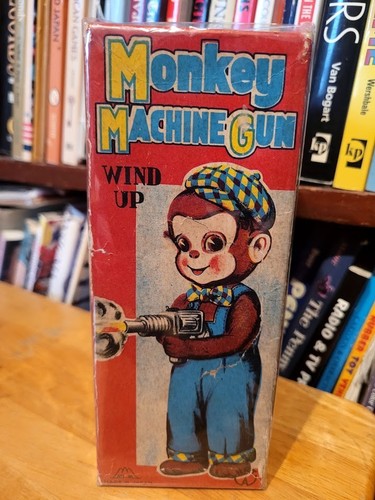 NICE 1950's  FUJI PRESS KOGYU WIND UP  MECHANICAL MACHINE GUN MONKEY  BOX