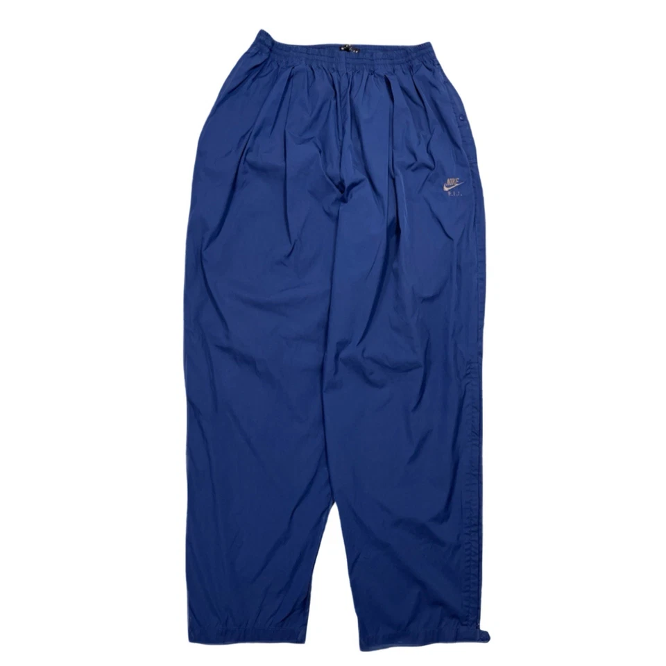 Pantalones de lluvia vintage Nike Golf Y2K para hombre cortavientos cremallera tobillo pista azul marino XL Foto 2 de 4
