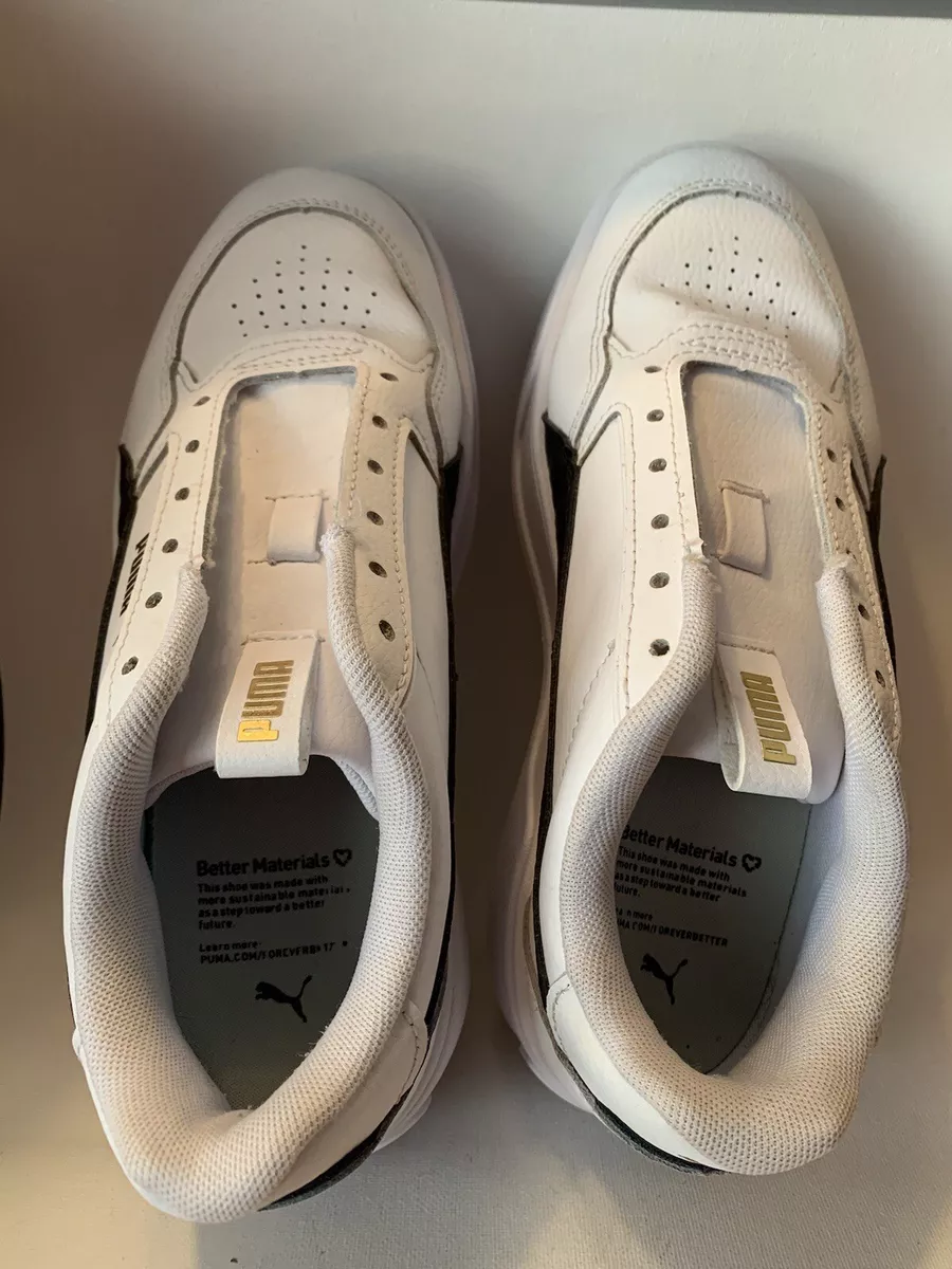 White pumas with black best sale stripe