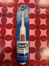 Oral-B Revolution Battery Powered Toothbrush - White/Pink