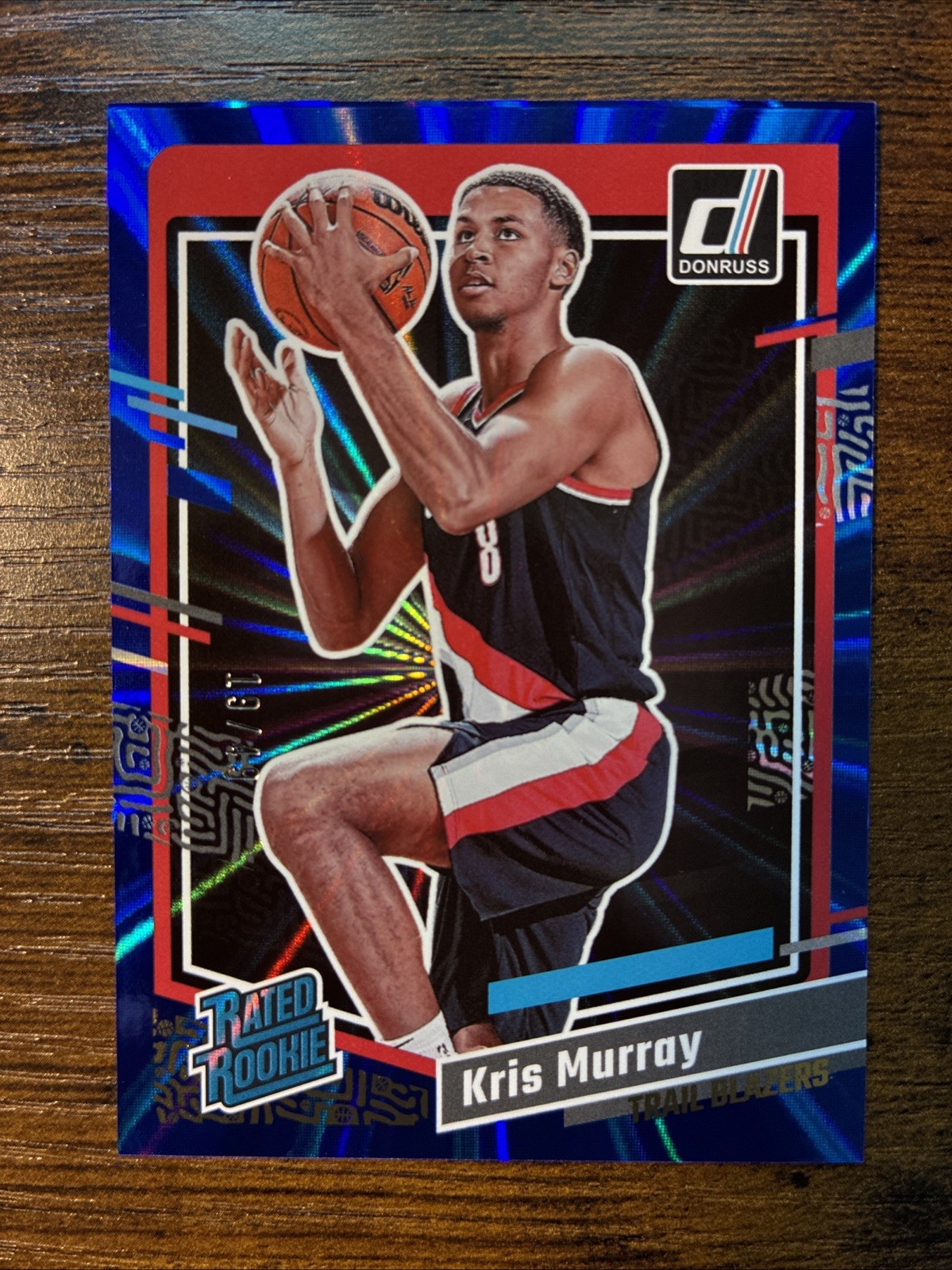 2023-24 Panini Donruss Rated Rookie Holo Blue Laser /49 Kris Murray RC #203