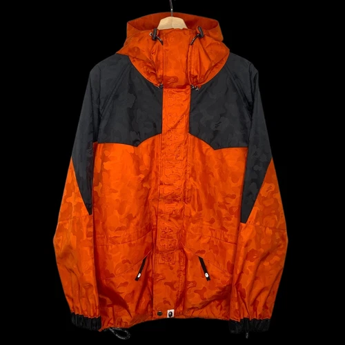 A BATHING APE (BAPE) BAPE A BATHING APE OG GORE TEX Giacca da snowboard mimetica jacquard (nero arancione) M