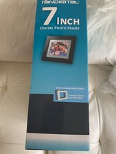 Pandigital 7 inch digital photo frame, plays music and videos, holds 6400 image