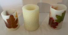 Three flameless LED pillar candles.