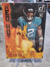 2025 Donruss Travis Hunter Red Hot Rookies RC #RHR-TVH Jaguars
