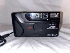 Minolta AF101R Point Shoot 35mm Film Camera Auto Focus Red Eye Black