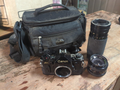 Canon A-1 Camera W/Case, Canon Sigma Zoom 2 1:4.5-5.6 75-300mm, Tamron F=28mm 